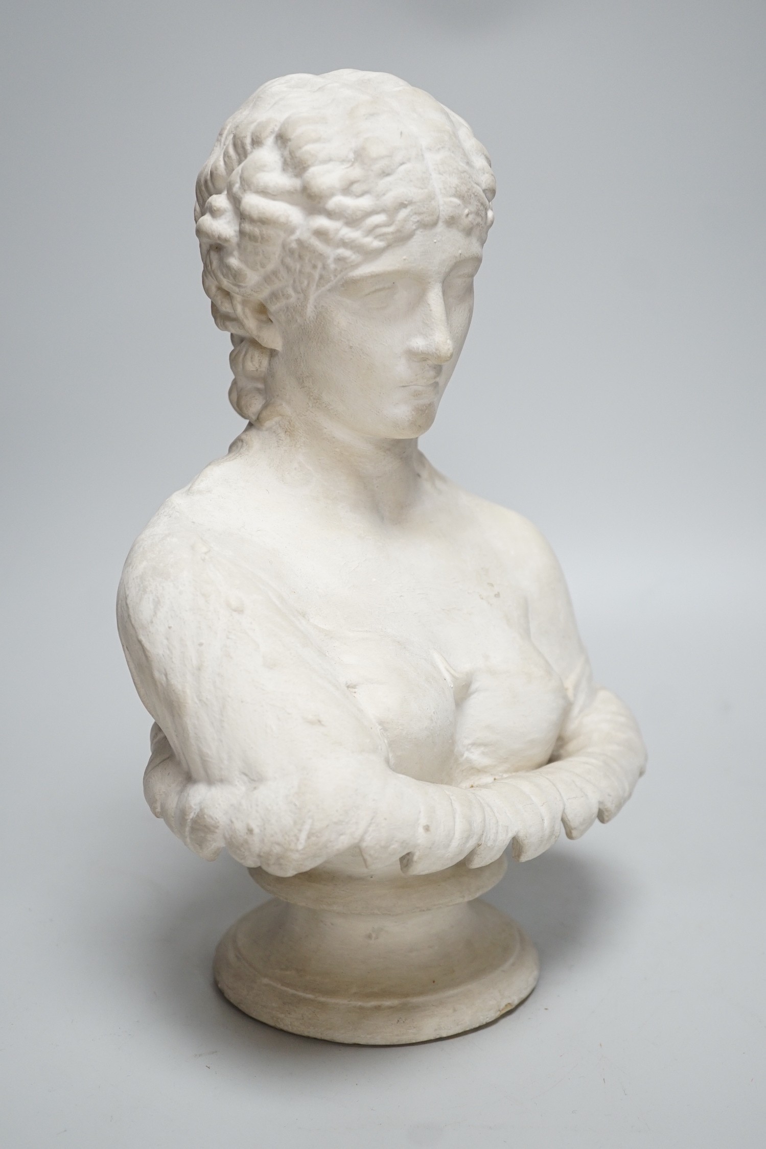 A small 19th century cast plaster bust, after the antique, 35cm